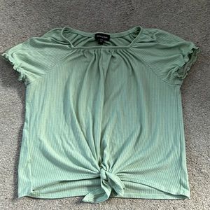 Cute mint green crop top with a tie on the bottom